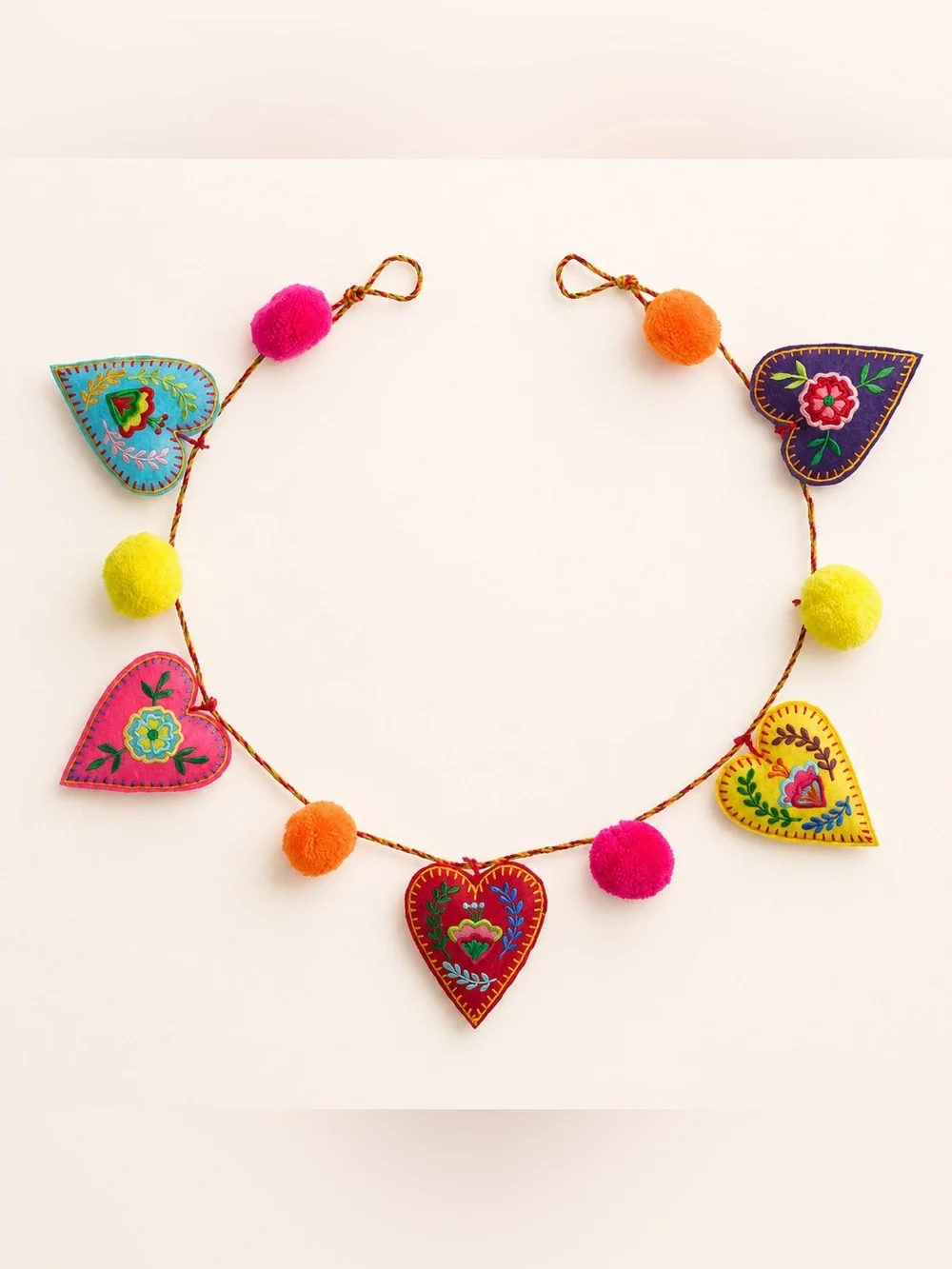 World Market Multicolor Embroidered Heart Pom Pom Garland